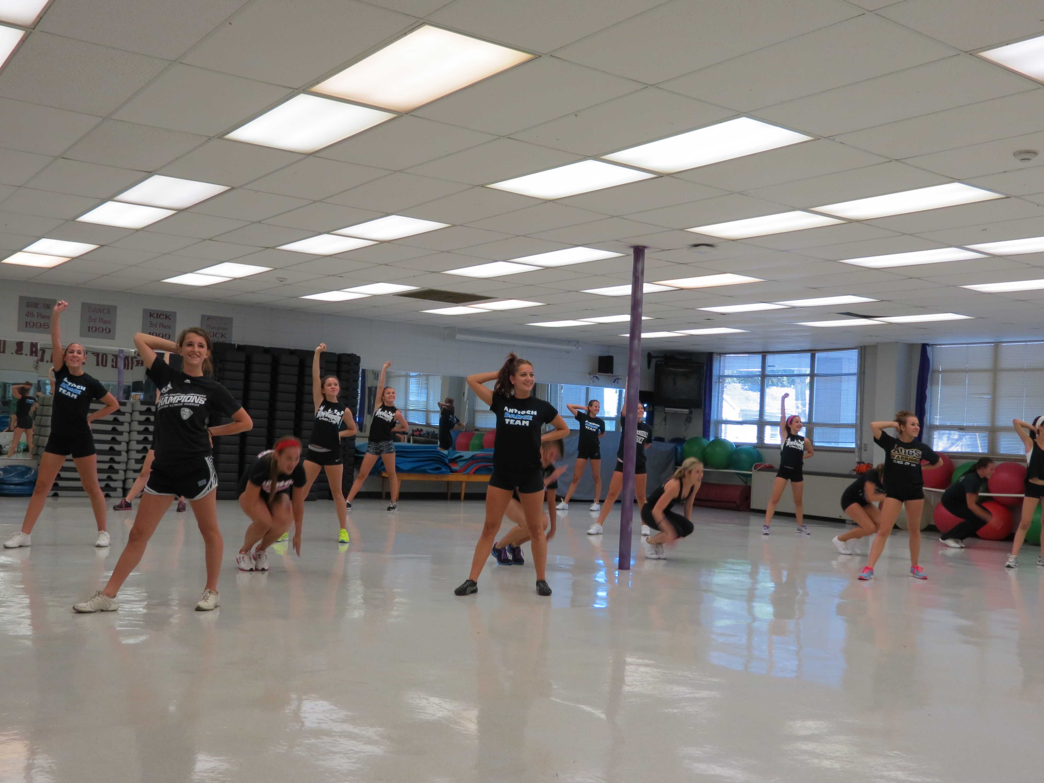 Alumni Return to Coach Varsity, JV Dance Teams