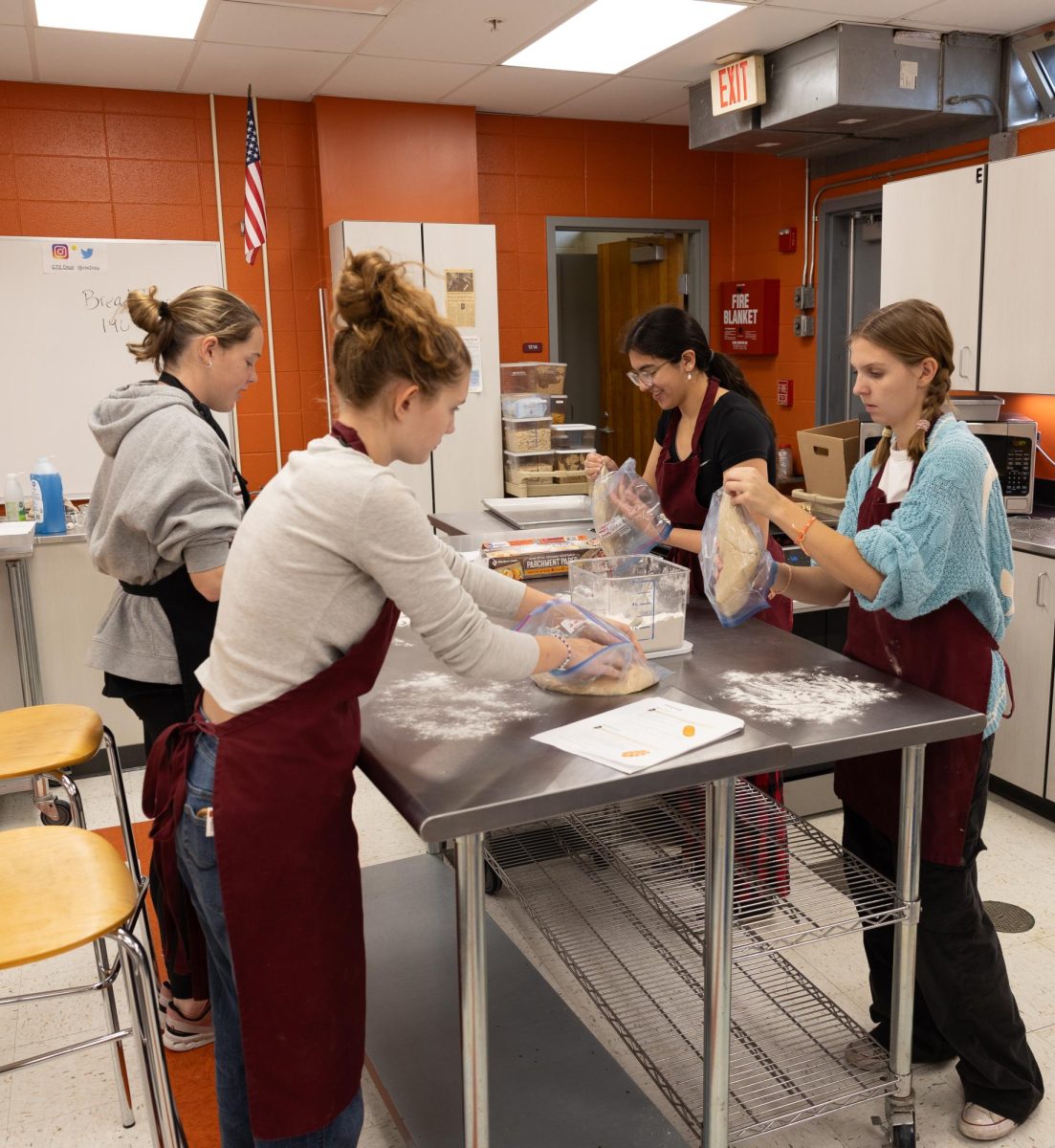 Students work together to bake goods