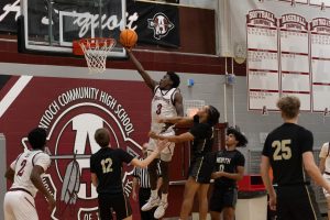 Senior Teddi Wetu making a layup 